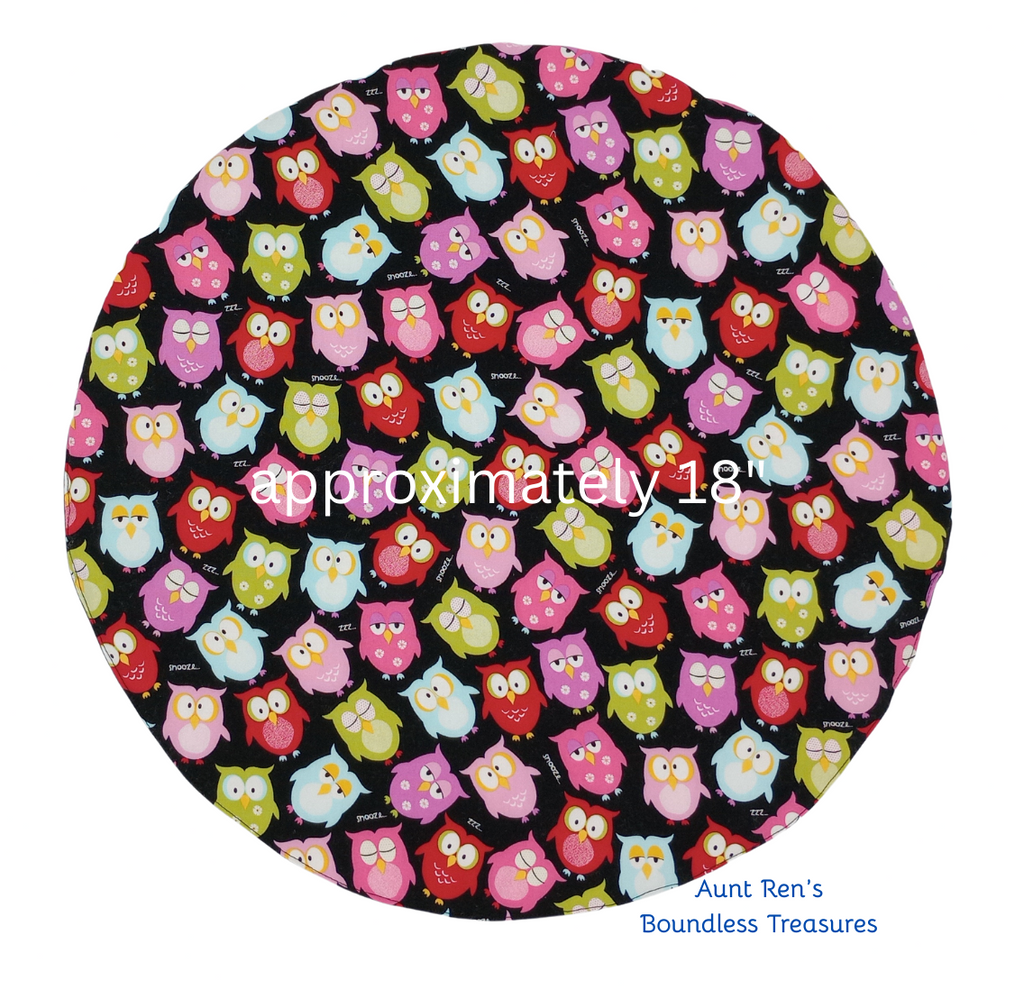 Rounded with owl pattern and text indicating size and brand