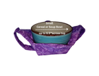 Purple dragonfly fabric bowl cozy holding a small turquoise soup bowl