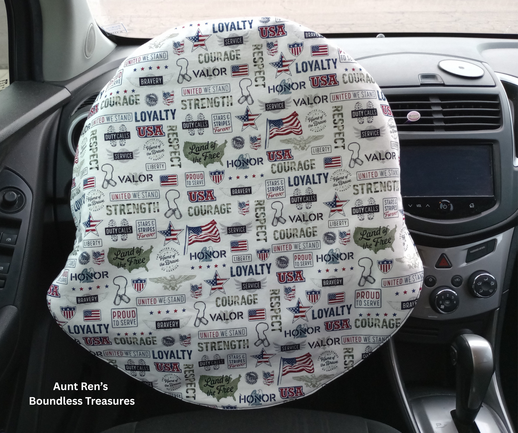 White steering wheel cover with patriotic wording