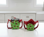 Pint size cozies with lady bugs and polka dots in a kitchen