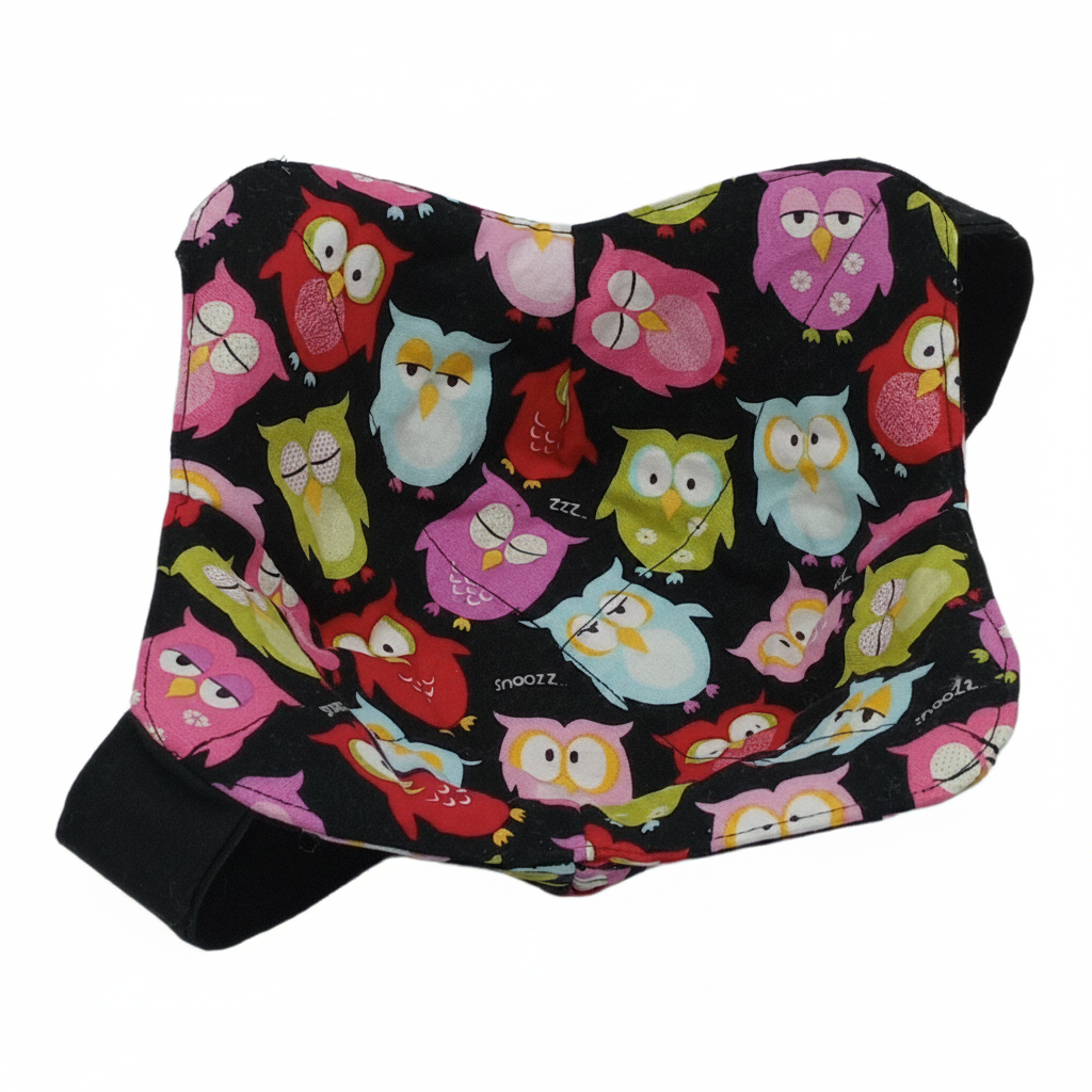 colorful owls on black fabric with black strap underneath, shaped to hold bowls