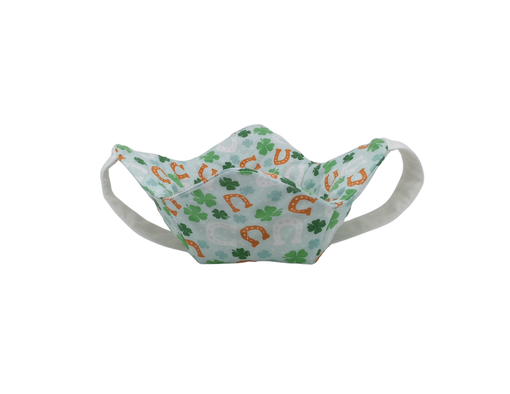 Fabric face bowl cozy with clover and horseshoe pattern on a white background