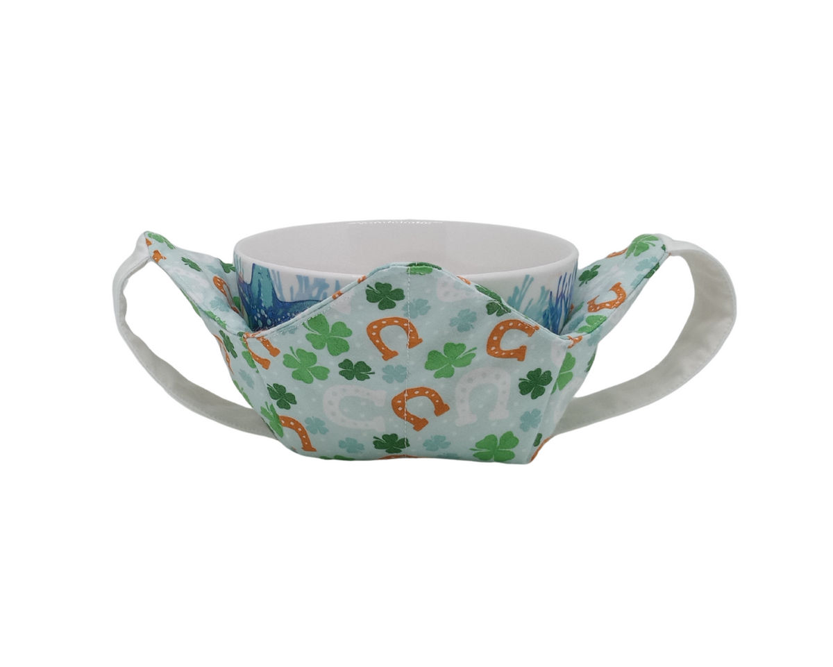 horeshoe and shamrock print fabric bowl cozy with white straps