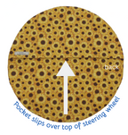 Patterned steering wheel cover with text indicating where to slip the pocket over the top.