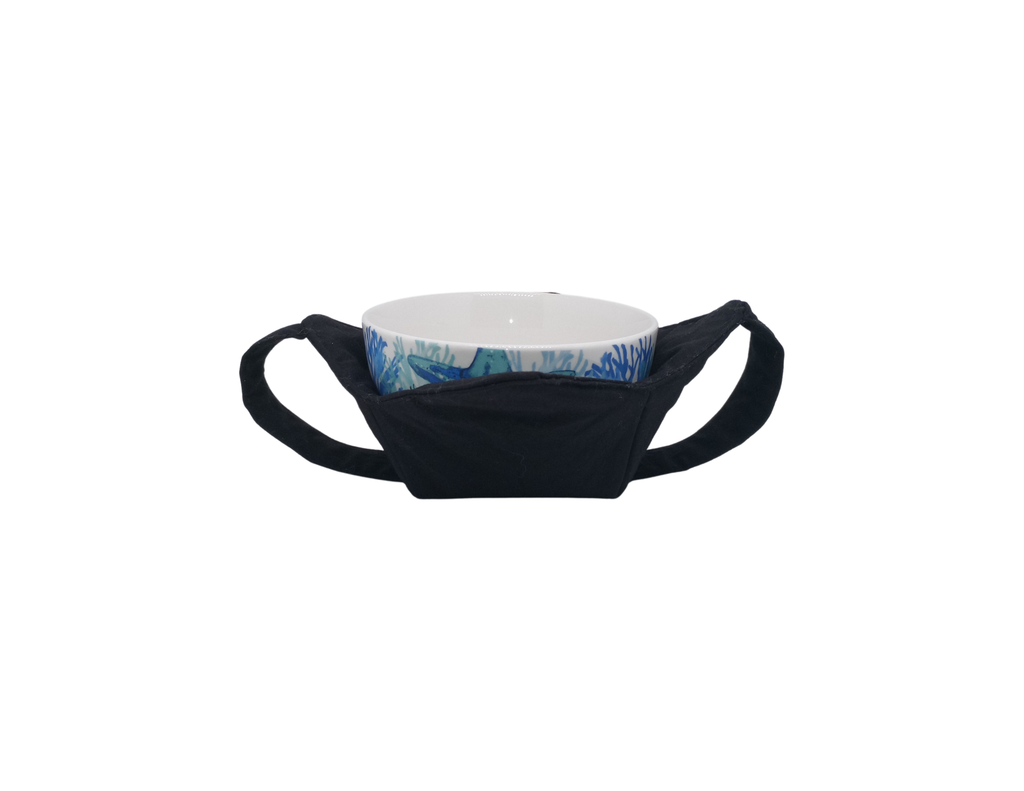 Black microwavable cozy with a blue and white bowl sitting inside it and black straps on the outside