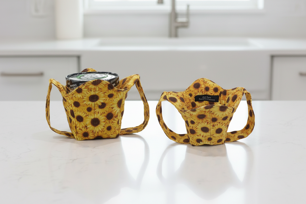 two sunflower ice cream cozies with handles for hand support