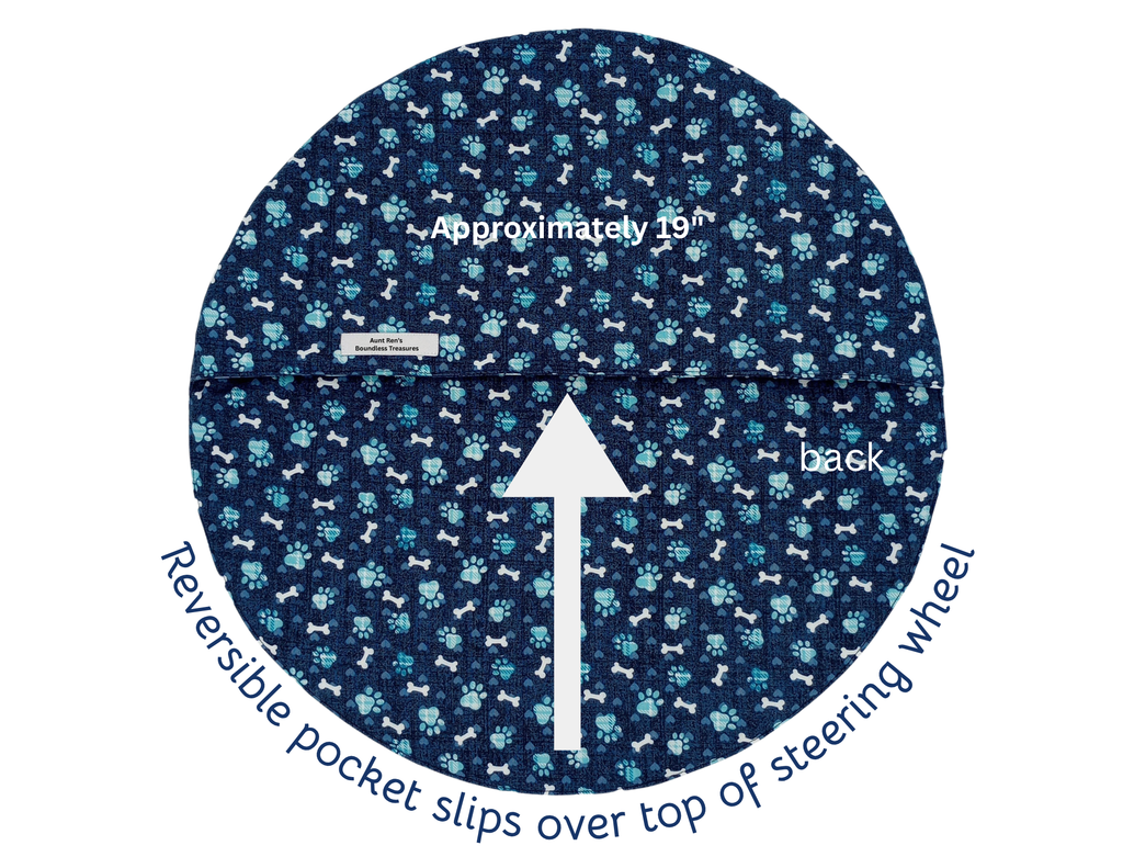 blue fabric with paw prints and dog bones reversible steering wheel cover