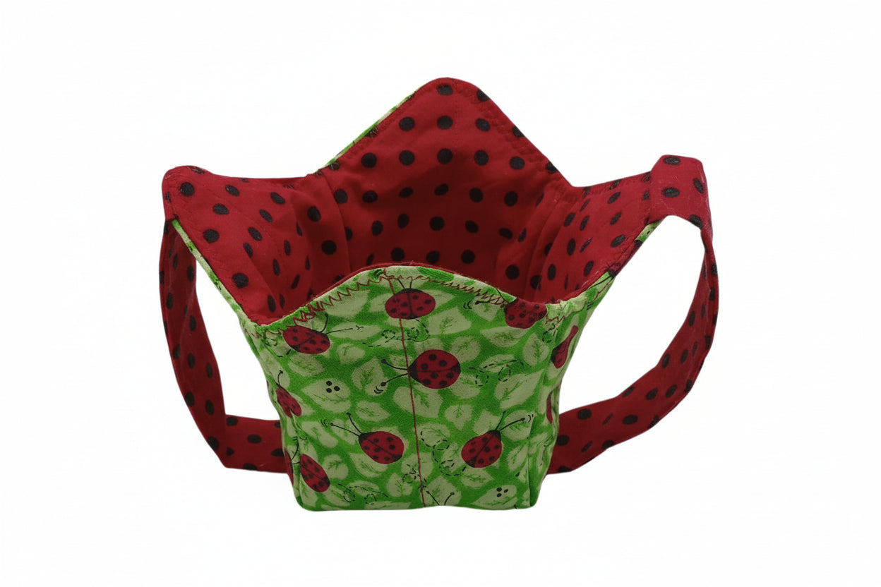 lady bugs on green fabric and black polka dots on red fabric ice cream holder with handles